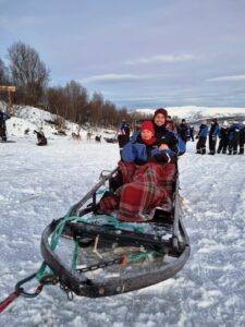 nelly and philipp sitting in the sleigh